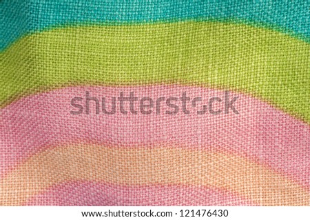 Stamped multicolored lines fabric. Natural linen fabric.Pink, blue, green and beige clors.
