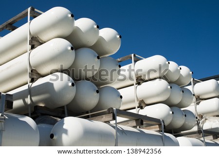 White industrial butan bottles.Compressed natural gas
