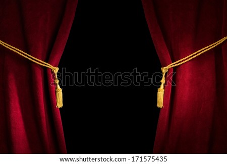 Red Velvet Curtain With Tassel. Close Up Black Isolated Curtain