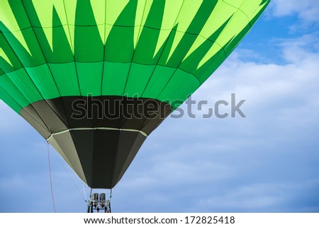 Green Balloon on blue sky