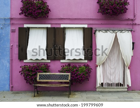 Bright pink color house in Burano, Venice