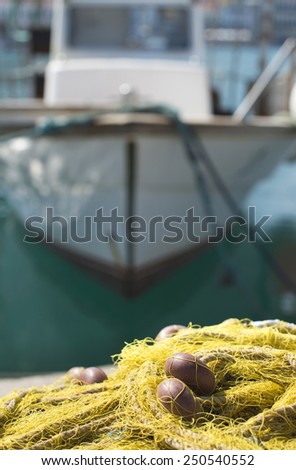 Fishnets on fish boat. Yellow net. Greece, Gythio