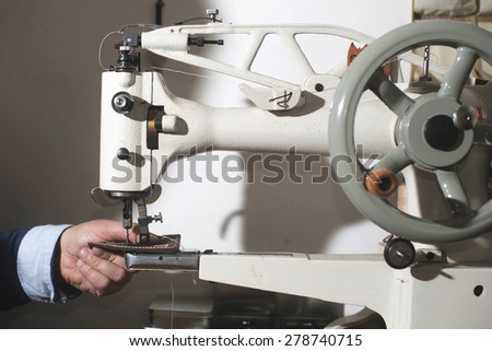 Sewing leather. Manual machine