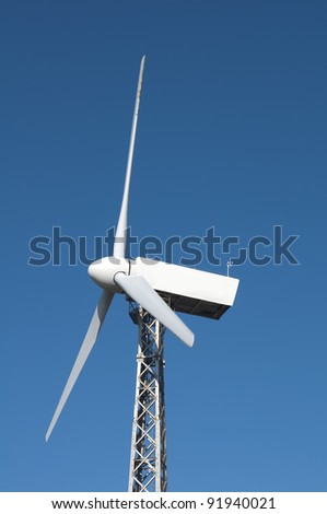Wind generators on blue sky.Close up propeller