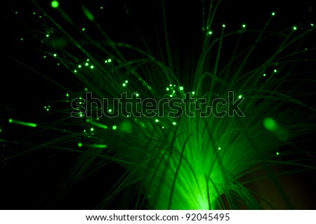 Optical fibers of fiber optic cable. Internet technology. Green color