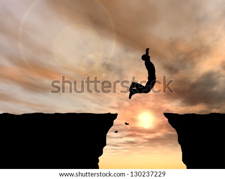 Concept Or Conceptual Young Man Or Businessman Silhouette Jump Happy From Cliff Over Gap Sunset Or Sunrise Sky Background As Metaphor To Freedom,Nature,Active,Mountain,Success,Free,Joy,Health Or Risk