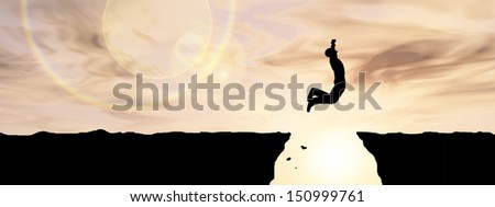 Concept or conceptual young man or businessman silhouette jump happy from cliff over  gap sunset or sunrise sky background as metaphor to freedom,nature,active,mountain,success,free,joy,health or risk