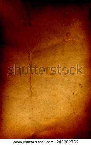 Concept or conceptual old vintage brown burned paper background, metaphor to antique, grunge, texture, retro, aged, grungy, ancient, dirty, torn, damaged, stained, frame, manuscript, material designs