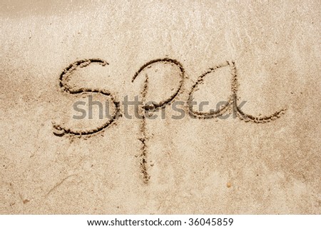 Spa handwritten in sand for natural, symbol,tourism or conceptual designs