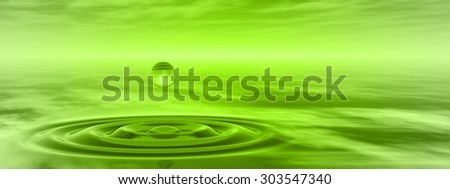 Concept or conceptual green liquid drop falling in water with ripples and waves background banner