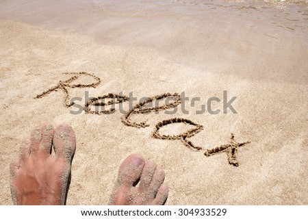 Relax or water hand written in sand on a beach on an exotic island background with feet for summer, ocean, sea, travel, vacation, tourism, tropical, coast, message, resort, paradise, sunny or water