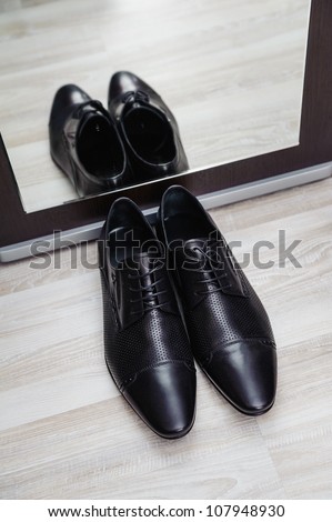 new stylish man shoe with mirror reflection