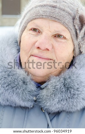 benevolent old woman portrait. smile face