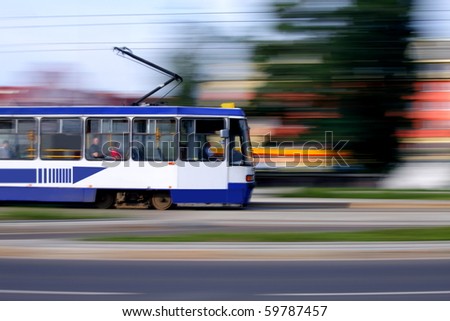 [Obrazek: stock-photo-old-blue-tram-rider-fast-on-...787457.jpg]