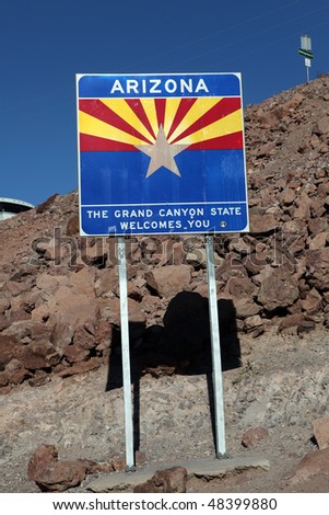 Arizona state sign standing on the rocks