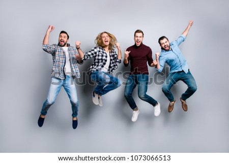 Leadership network leisure rest relax recreation enjoy vacation stag party people concept. Four dreamy funky delightful screaming football fans gesturing jumping up isolated on gray background