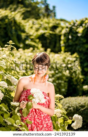 beautiful girl with a flower hydrangea
