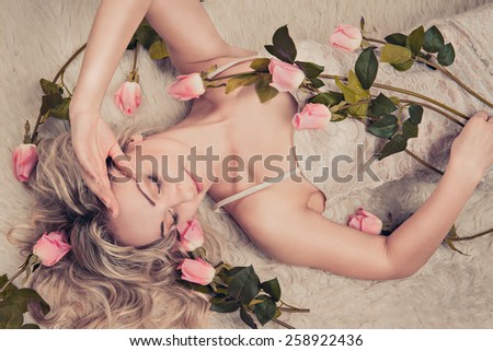 charming girl with a flowers. young woman has a beautiful face.