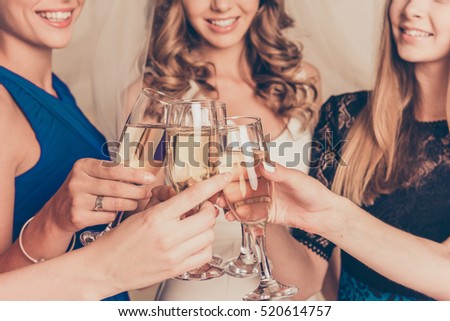 Closeup photo of cheerful girls celebrating a bachelorette party.