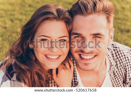 happy young couple in love smiling.