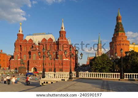 Moscow, Russia - August 18, 2013: The State Historical Museum on Red Square, landmark on the square in front of the museum walk men, women and children