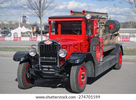 Moscow, Russia - April 25, 2015: Former Soviet restore fire truck AMO-4 (ZIL) red, front view