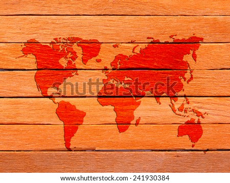 World Map on orange wooden background
