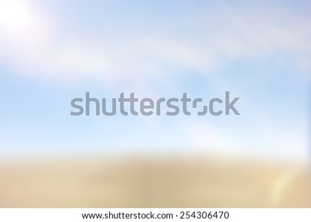 Blur sand patch on the sky background. For the products according to your preferences.