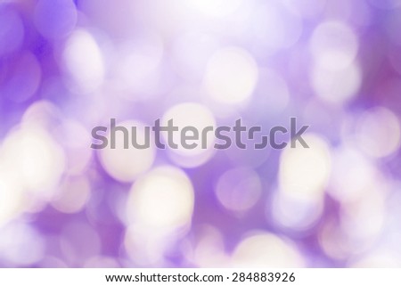 Abstract blur with bokeh of light through the trees blurred sea with Bright sky