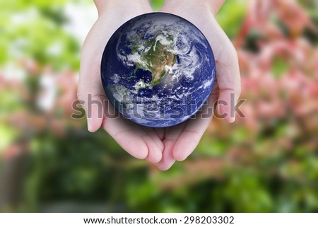 the planet among human hands in concept Healthy nature healthy planet:The concept of keeping the campaign. On World Environment Day. Elements of this image furnished by NASA