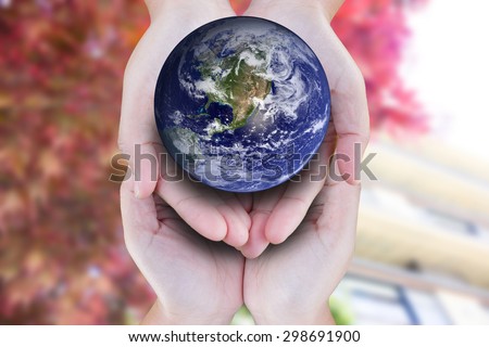 the planet among human hands in concept Healthy nature healthy planet:The concept of keeping the campaign. On World Environment Day. Elements of this image furnished by NASA