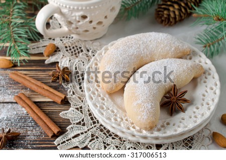 Christmas sugar cookies Crescent sprinkled with powdered sugar. Selective focus