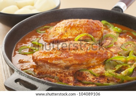 A warm winter meal, chicken paprika has a sauce made from onion, paprika, tomato and green capsicum, with sour cream stirred in at the end.