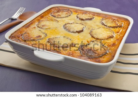 Greek dish, Moussaka, layers of eggplant and lamb topped with bechamel sauce and cheese.