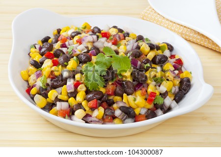 Mexican style salad of black beans and corn, with a dressing flavoured with toasted cumin. Delicious with chilli!