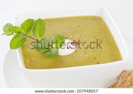 Homely split pea soup  with a dollop of yoghurt and mint.