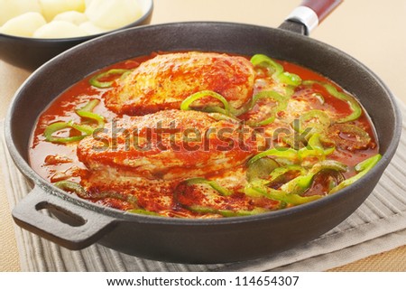 A warm winter meal, chicken paprika has a sauce made from onion, paprika, tomato and green capsicum, with sour cream stirred in at the end.