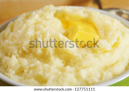 Mashed potato with melting butter, close-up.