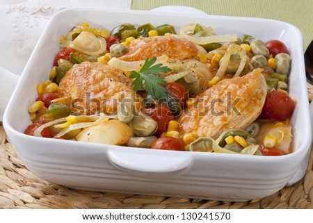 Famous American stew, Brunswick Stew is made with chicken, tomatoes, corn, lima beans, green peppers and potatoes.