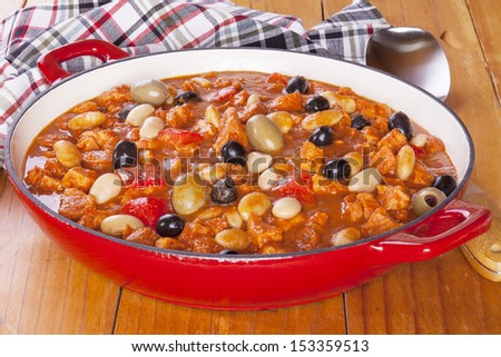 Spanish pork stew with olives and butter beans.