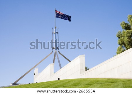 Australian flag flying on the flag pole of Parliament House, Canberra,Australia