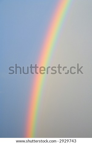Simple rainbow pic with blue at one side, grey at the other.