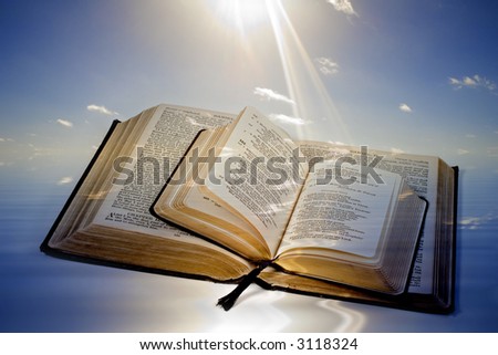 Holy Bible and Prayer Book, both open with a background of light rays striking page. Concepts of Let There Be Light, Creationism, Glory of the Gospel.