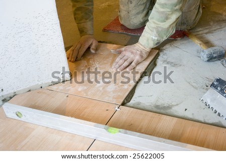 installing the ceramic tile on floor