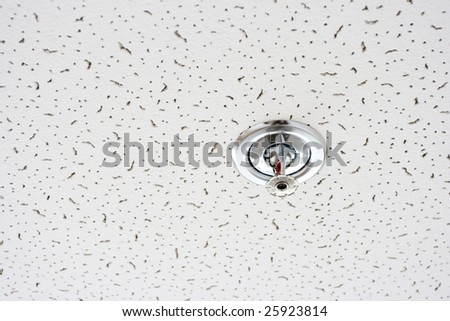 fire-prevention sensor bolted on sections of the hanging ceiling