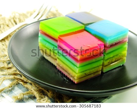 colorful treat of rainbow layered gelatin dessert