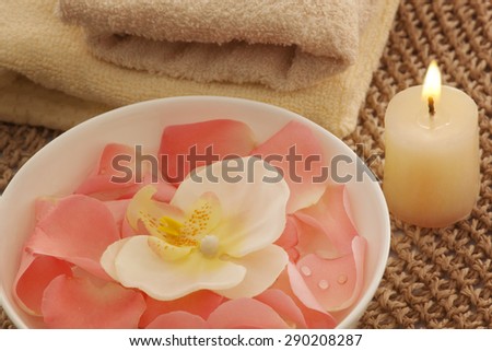 Bowl with orchid and rose petals