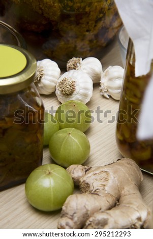 Raw garlic , ginger and gooseberry