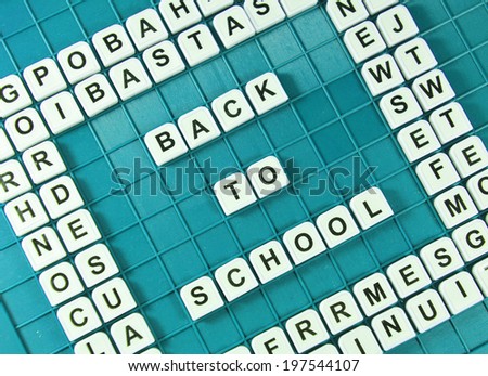 Back to school concept on game board with letters
