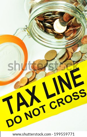 Financial tax fraud (evasion) concept with yellow tape and a jar of money